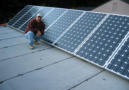 Burbank Resident Robert Beher on the roof with his 2 kW solar PV system