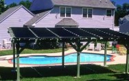 solar heated swimming pool doubles as awning