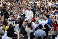 Pope Francis surrounded by crowds, but fails to recognise the population issue