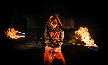 Girl at rave fire-spinning