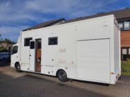 Huge motorhome wth side door and steel shutters