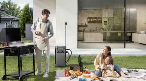 Family in garden with battewry